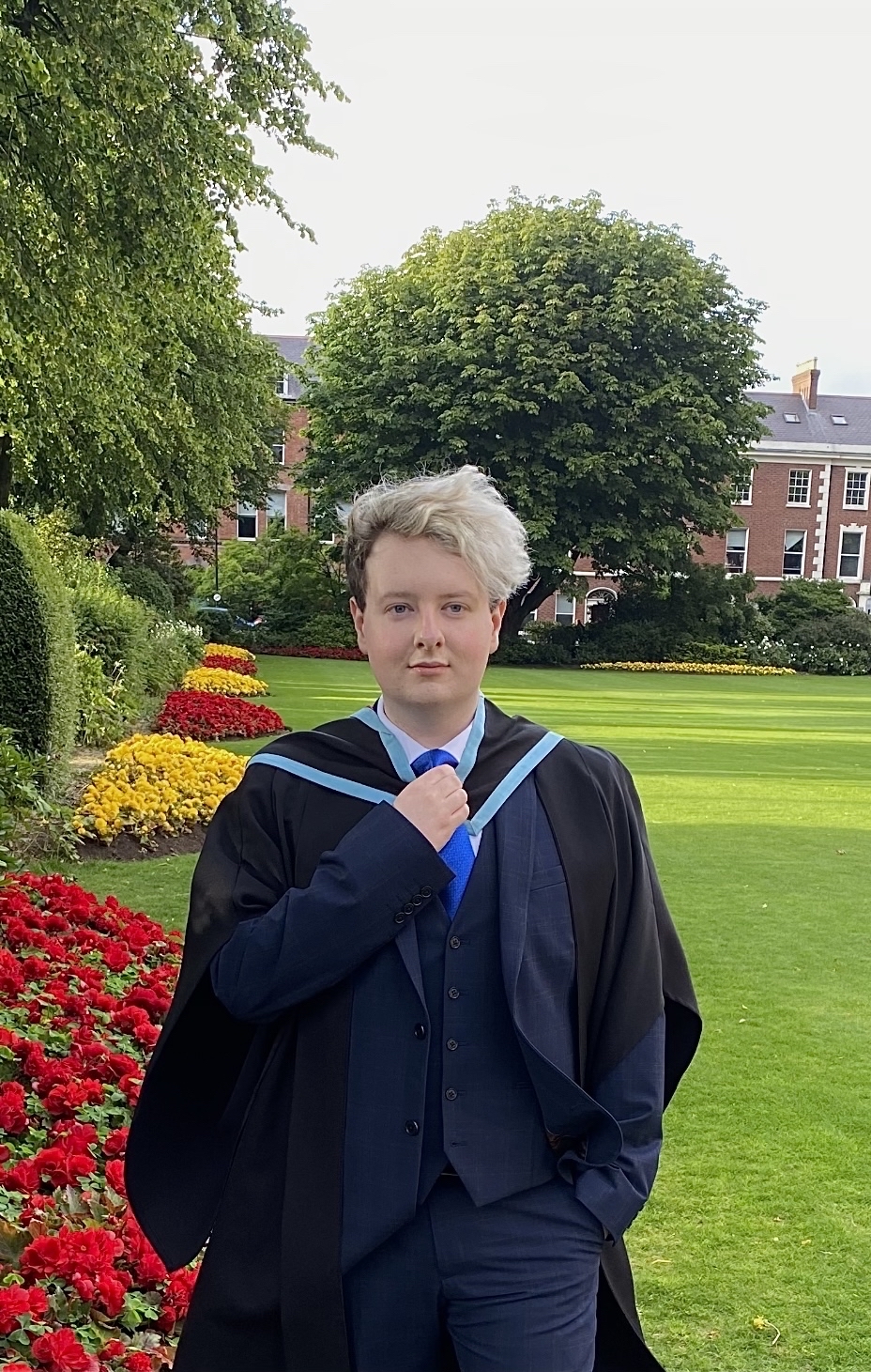 Male student on graduation day outside the university