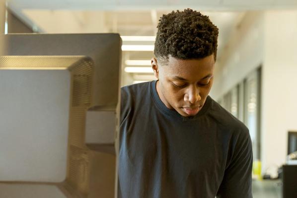 Black student at a computer