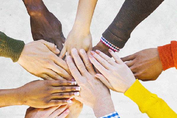 An ethnically diverse group of hands