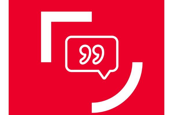 white outline of speech marks within white brackets against a red background