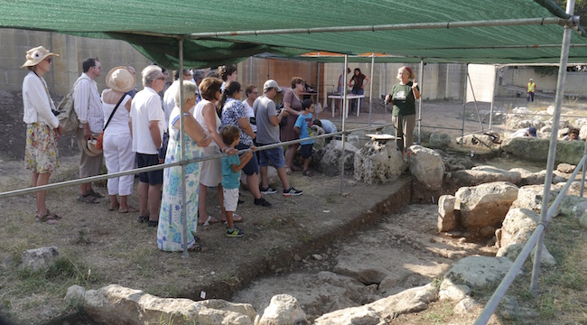 Figure 6: Principal Investigator and site director Prof. Caroline Malone (on the right) talking to visitors during the open day at Kordin III.