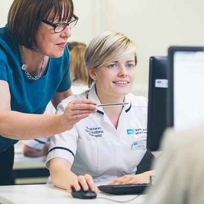 Librarian and healthcare professional working together