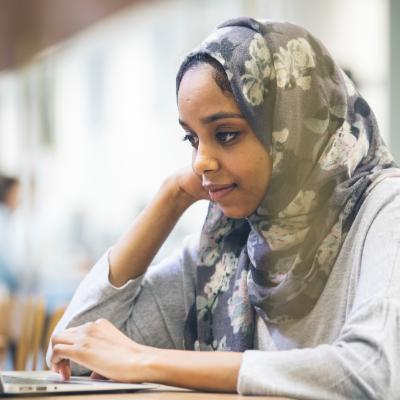 Individual working at a laptop