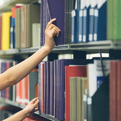 Person retrieving book
