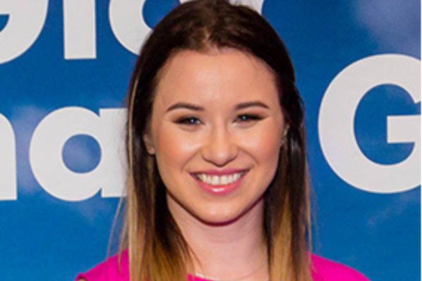 Image shows a headshot of Michaeline Donnelly