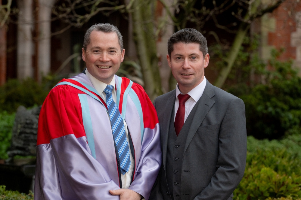 male graduate and husband celebrating at Winter graduation 2023