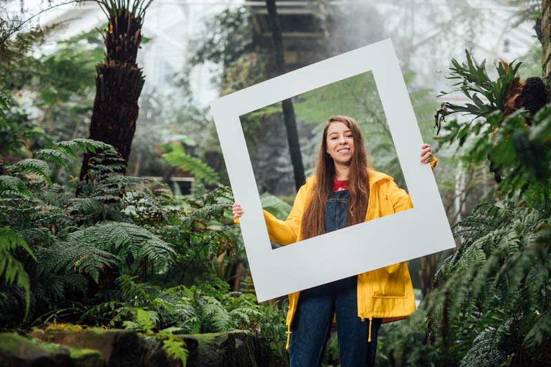 Image of Olivia with large polaroid frame in Tropical Ravine