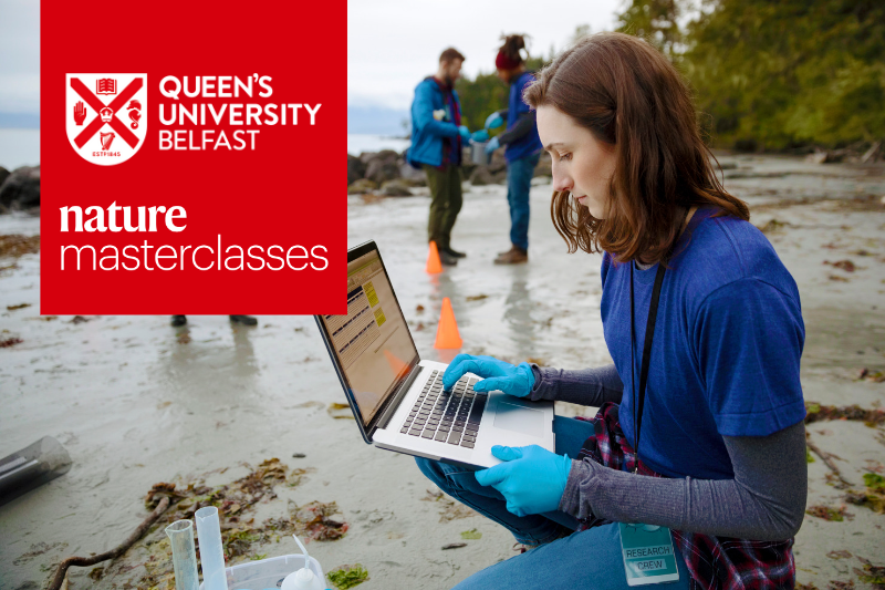 Female researcher with laptop on beach with colleagues. Nature Masterclasses.