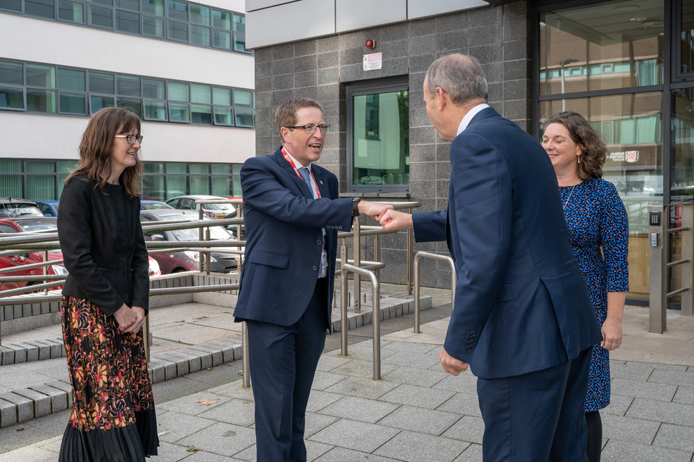 Taoiseach Micheal Martin visits Queen's University Belfast - with Cancer Centre staff