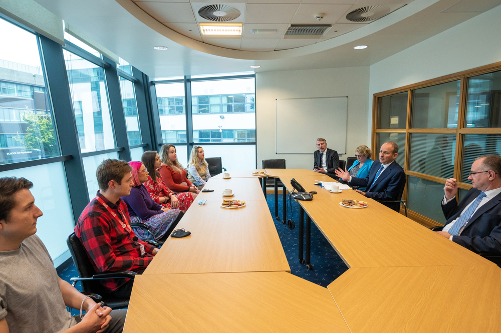 Taoiseach Micheal Martin visits Queen's University Belfast - board room meeting with staff and students