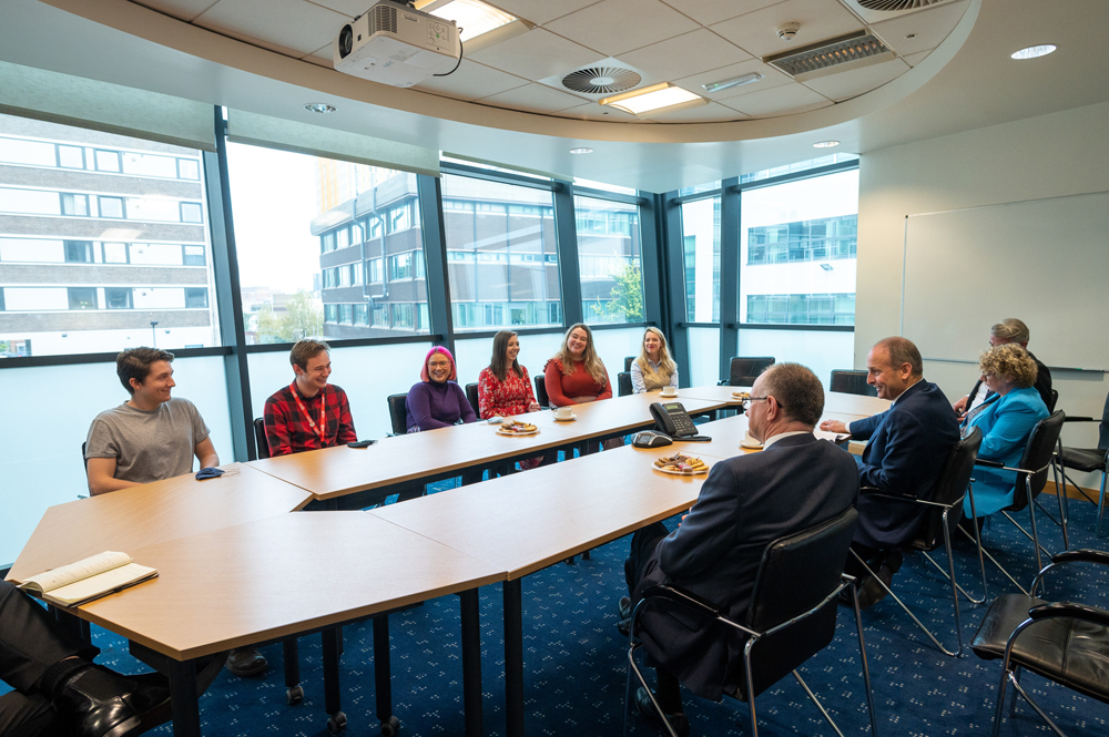 Taoiseach Micheal Martin visits Queen's University Belfast - board room meeting with staff and students