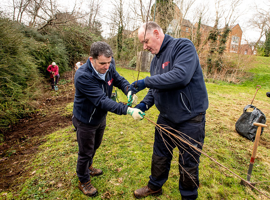 Head Gardener Paul Wallace and Lead Hand Gardener William Kirkwood helping at tree planting at Elms Village