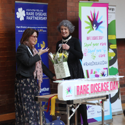 Rhoda Walker and Miriam McCarthy gift flowers