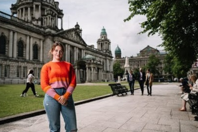 female student standing outside the grounds of Belfast city hall