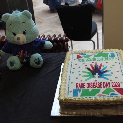 Rare bear guarding the cake