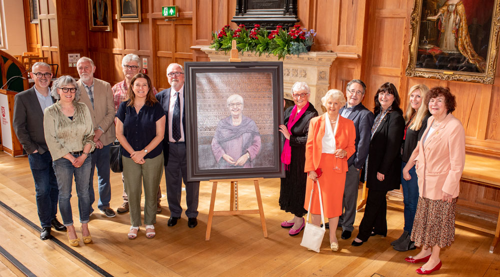 group photo at Carol McGuinness portrait unveiling