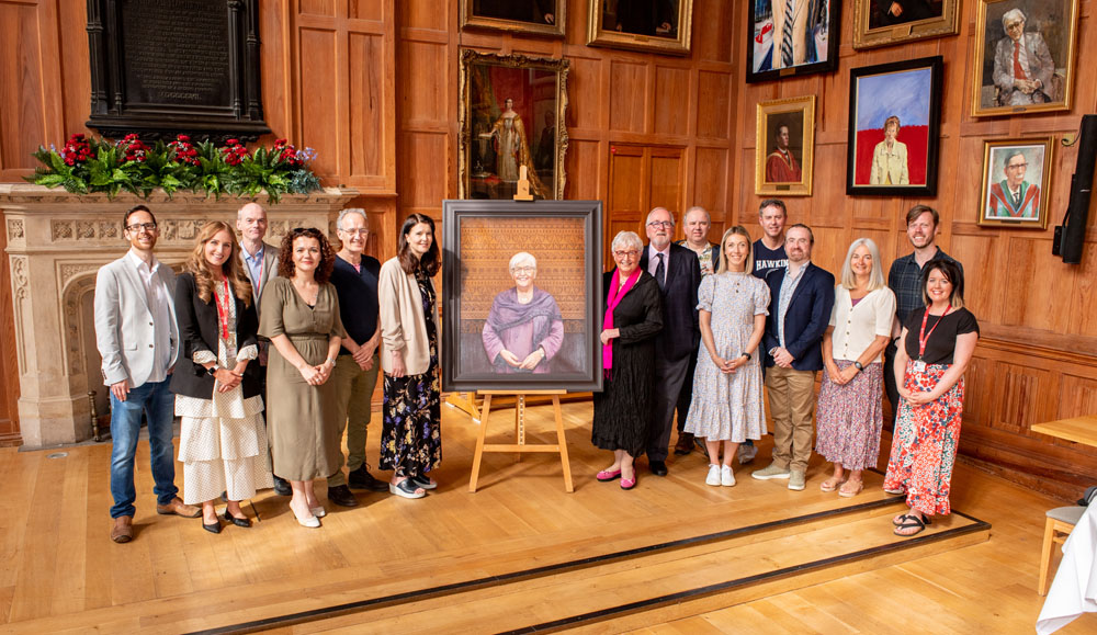 group photo at Carol McGuinness portrait unveiling