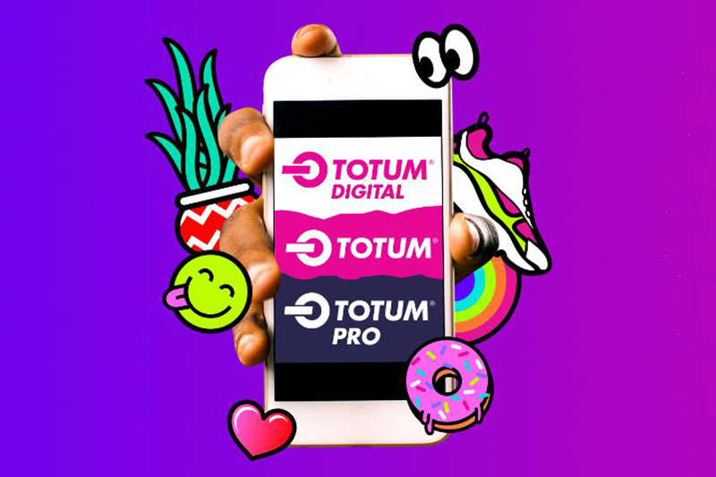 Totum app on a phone screen with bright digital stickers around it