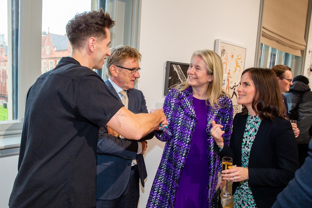 Ben Crothers shaking hands and talking with Fiona Naughton and Helen Carrick at NGXX