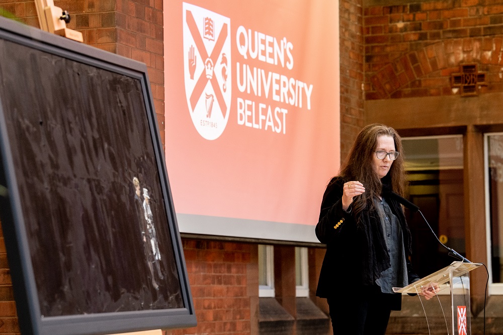 artist Michelle Rogers speaking at the unveiling of her portrait of Queen Elizabeth II and Professor Mary McAleese