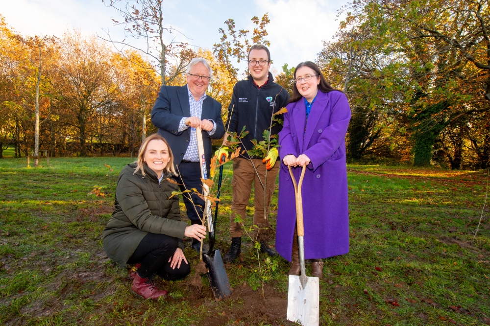 Belfast Deputy Lord Mayor with Queen's staff and student at the tree planting at Malone Playing Fields, November 2022