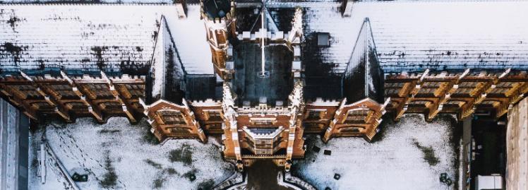 close-up snow-covered aerial view of the entrance to the Lanyon Building