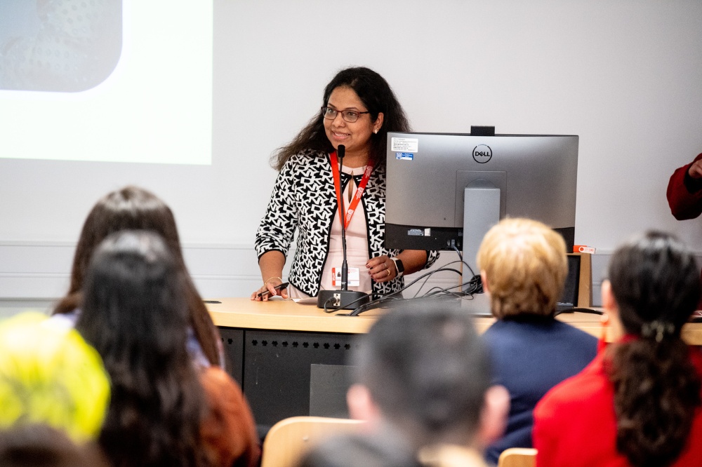 staff member giving a talk at the CNY celebrations, McClay Library