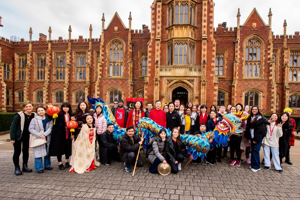 students, staff and local volunteers gathered outside Queen's Lanyon Building, CNY celebrations 2023
