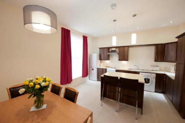 Image shows the kitchen in one of the staff accommodation sites
