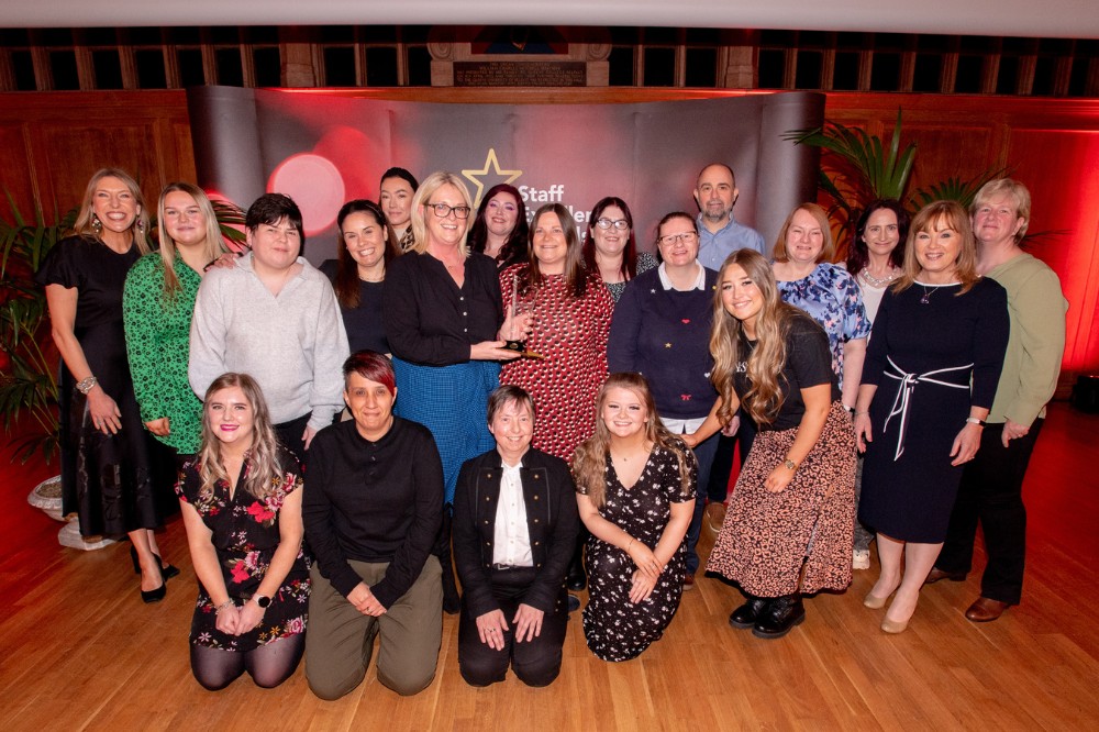 Childcare Services - Team of the Year Award winner, with compere Alexandra Ford and Mairead Regan, Chair of the Staff Excellence Awards Judging Panel