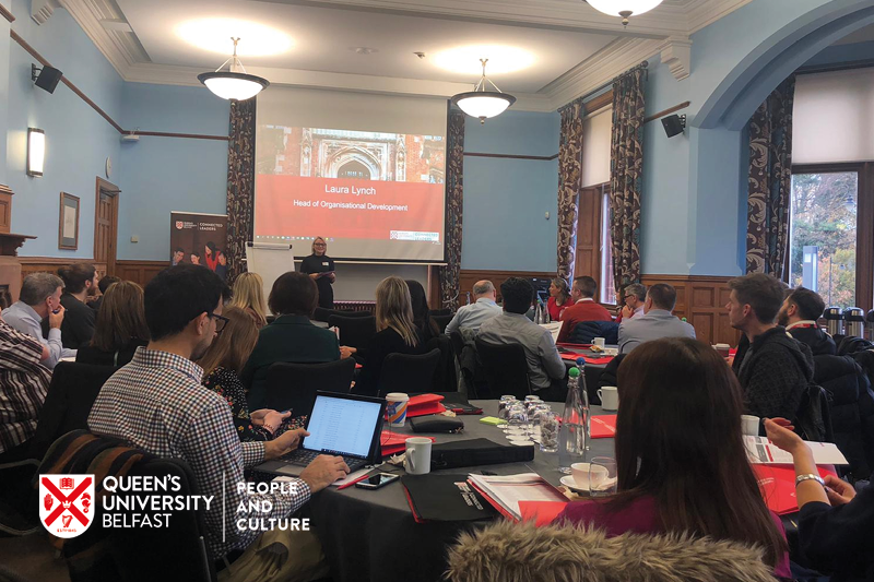 group of QUB staff in leadership roles at a training session