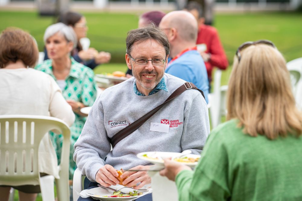 Staff carers enjoying a barbecue on Queen's quadrangle