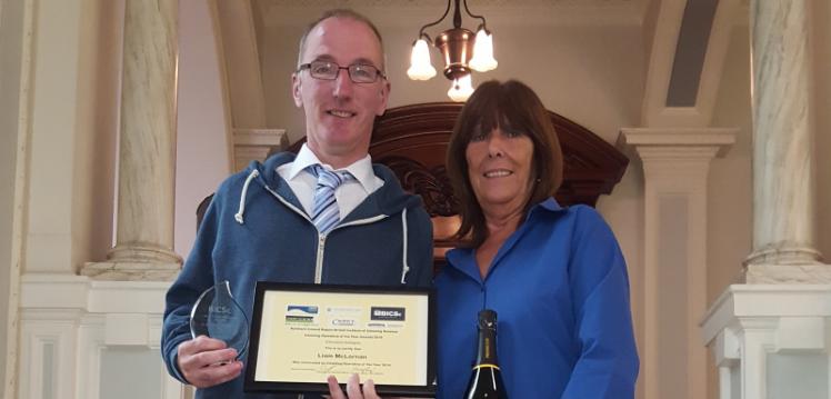 Queens Cleaner wins British Institute of Cleaning Science Award. Liam McLarnon(left) with his supervisor, Carol Clarke (right).