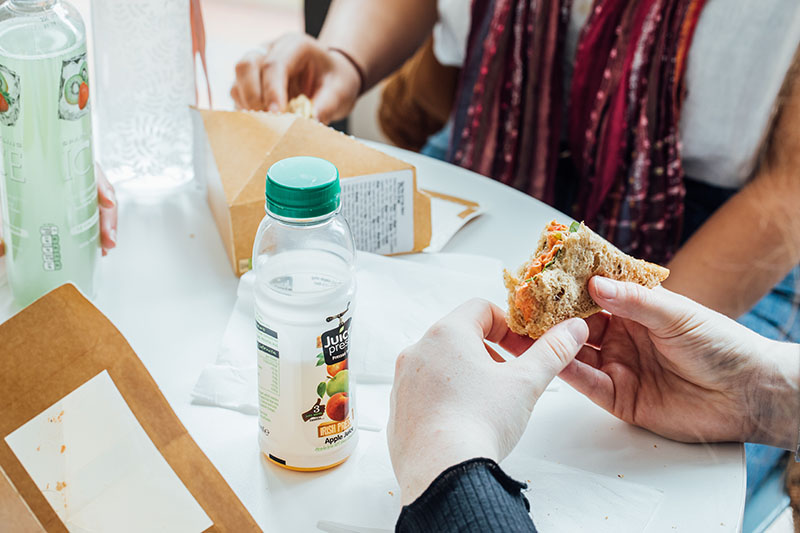 Students eating sandwiches