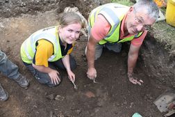 Volunteers Shannon and Frank excavating in Trench 1