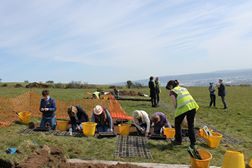 Women United excavating at Squires Hill