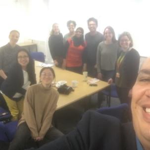 Salvador in a selfie with researchers at Sheffield University
