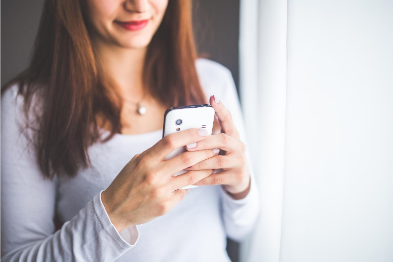 female browsing or texting on a phone