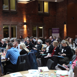 Conference room full of people