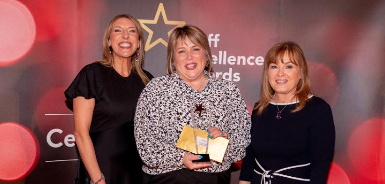 Maria Carrick - Outstanding Contribution Award winner, with compere Alexandra Ford and Mairead Regan, Chair of the Staff Excellence Awards Judging Panel