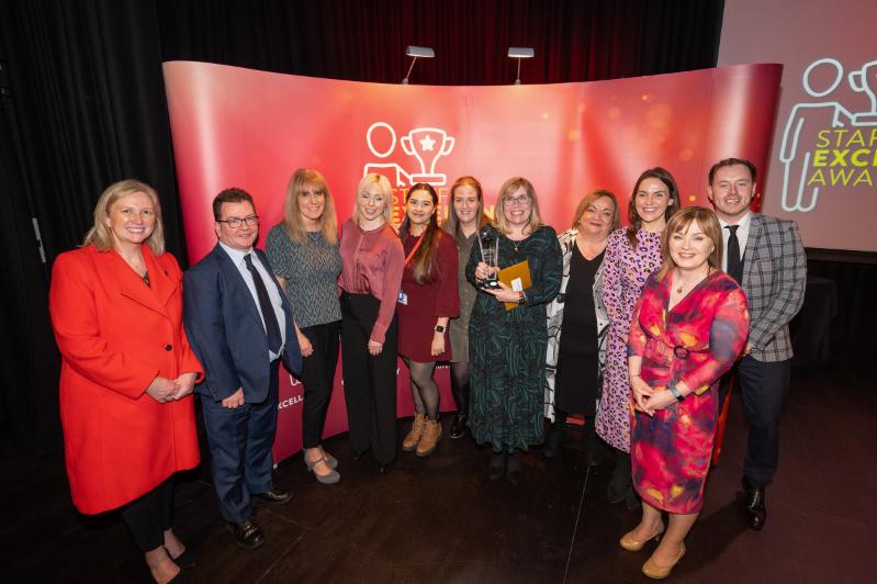 Image shows Co-Chairs of the Staff Excellence Awards Judging Panel, Gillian Magee and Mairead Regan, with the Clearing Project team and host Andrew Ryan