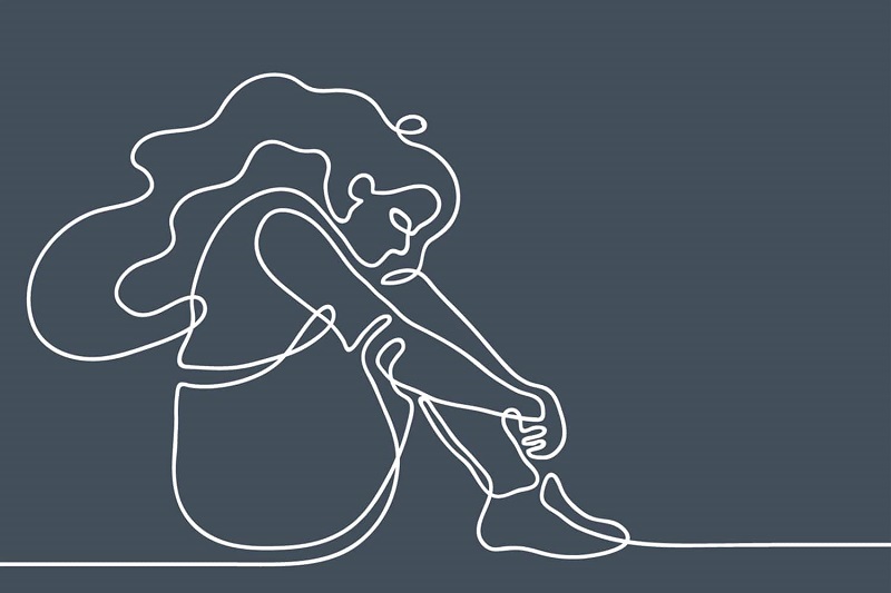 line graphic of solemn young woman seated on floor/ground with head bent and holding her knees up to her chest