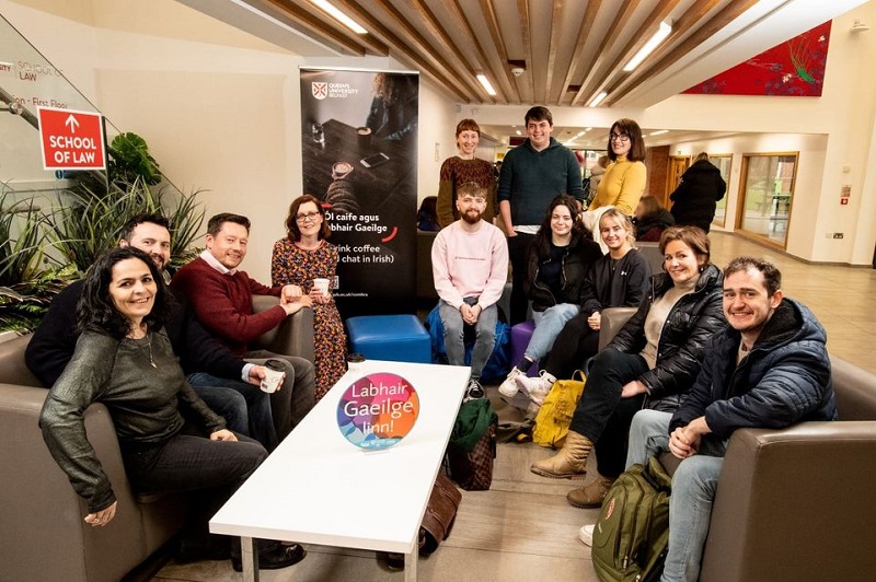 group of staff and students gathered in Junction cafe for a lunchtime Irish Conversation Circle