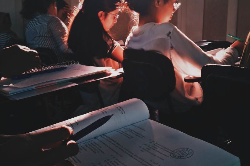 Pupils sat at individual desks whilst taking an exam