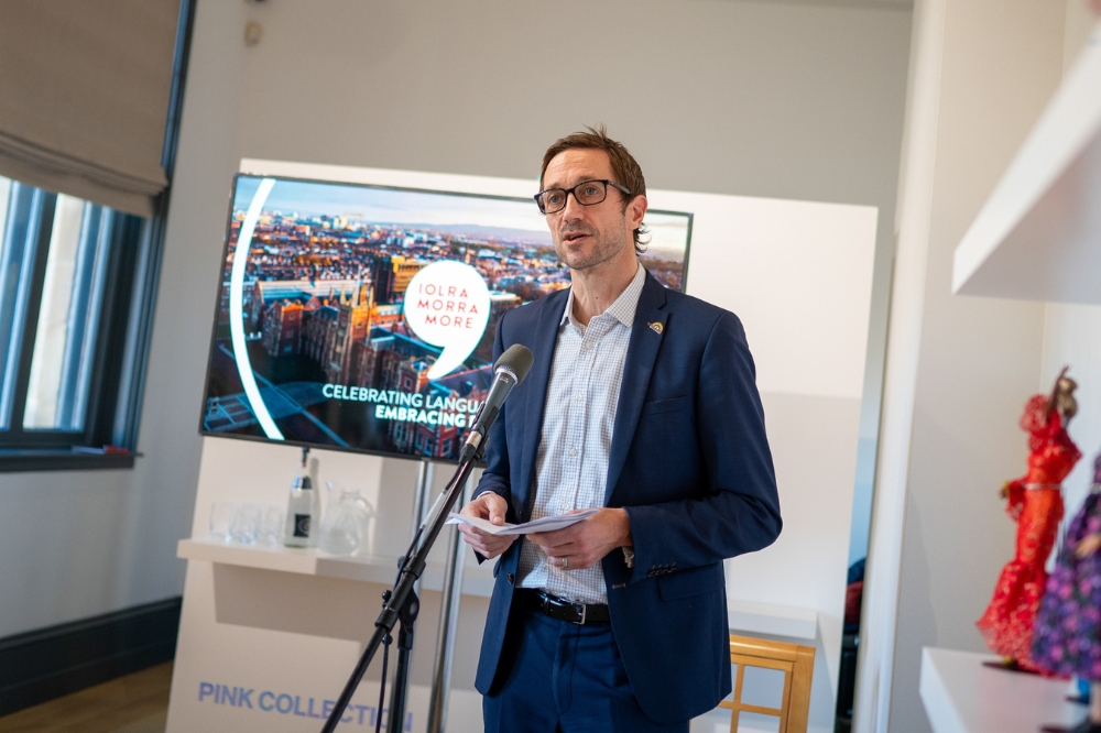 Conor Curran, Head of Diversity, Inclusion and Staff Wellbeing, welcomes staff and introduces Iolra, Morra, More - Queen's new Staff Network for Promoting Linguistic Diversity and Minority Languages - in the Naughton Gallery