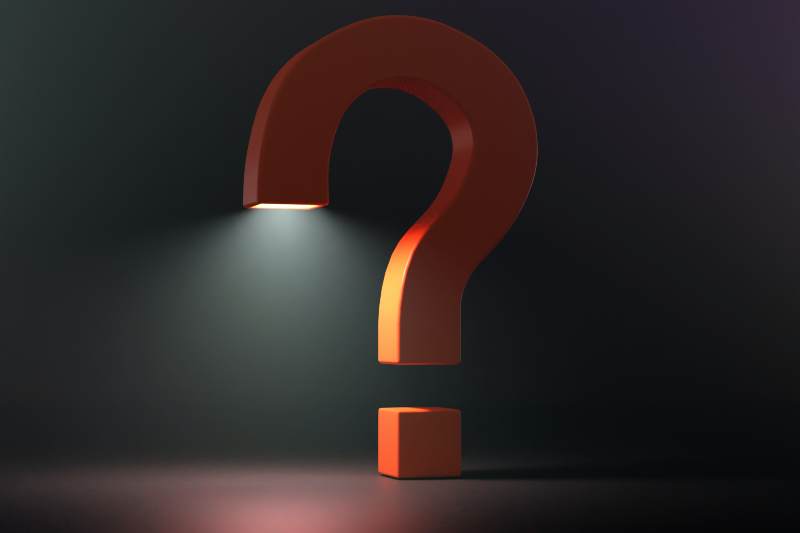 A graphic of a large Question Mark symbol, with a spotlight