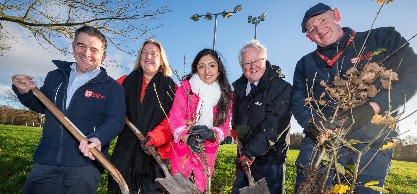 Planting trees at Malone Playing Fields, November 2023, Left to right: Head Gardener Paul Wallace; Staff Forum representative for the Global Marketing, Recruitment and Admissions Directorate Marelle Crawford; Staff Forum representative for the Development and Alumni Relations Directorate Natasha Sharma; Associate Pro-Vice-Chancellor Professor Michael Alcorn; Leadhand Gardener William Kirkwood