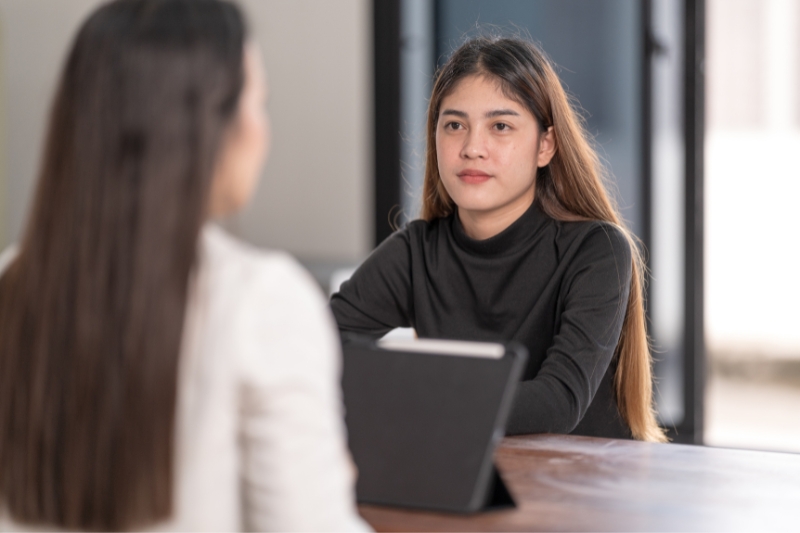 female student meeting with a mentor or adviser